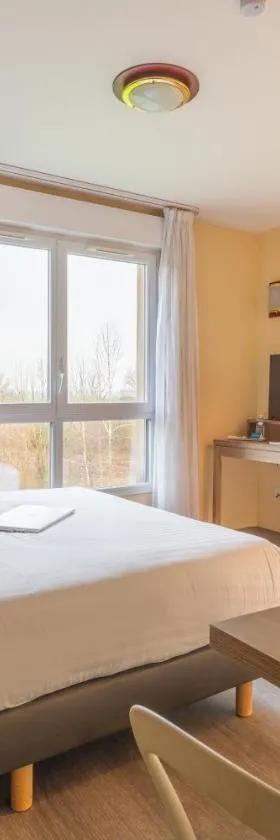 Zenitude Hôtel-Résidences Magny-les-Hameaux，位于马尼·莱斯·阿莫的酒店