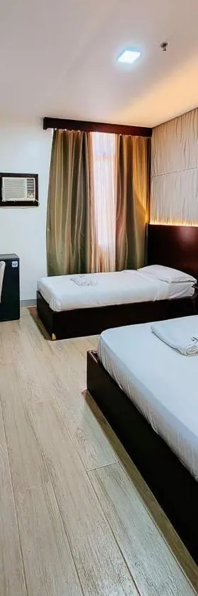 Bamboo Garden Bussiness Inn，位于第波罗的酒店