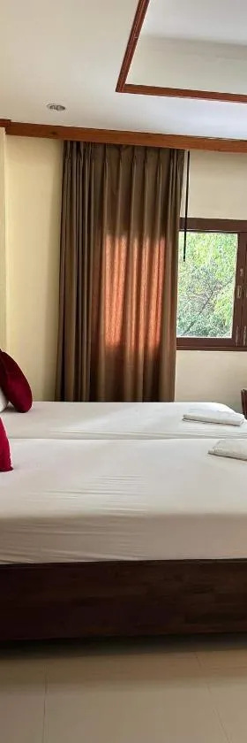 布达拉克撒旅馆，位于通奈潘海滩的酒店