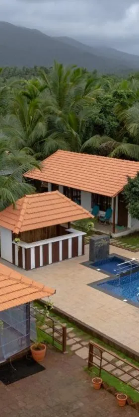 DhanRains Moonlight Retreat Cottages，位于帕罗林的酒店