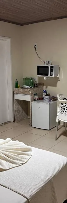 Flat - Condomínio Fechado - Frente Mar，位于伊塔帕里卡岛维拉克鲁兹的酒店