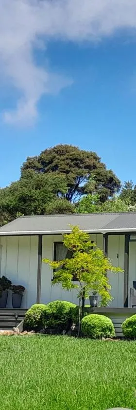 Kuaotunu's Peebles Cottage，位于Kuaotunu的酒店