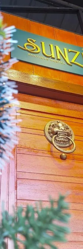 SUNZI BOUTIQUE HOSTEL : ซันซิ บูทีค โฮสเทล，位于勿洞的酒店