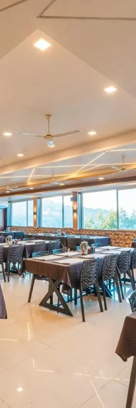 Treebo Kaizen, 3 Kms From Paragliding，位于潘奇加尼的酒店