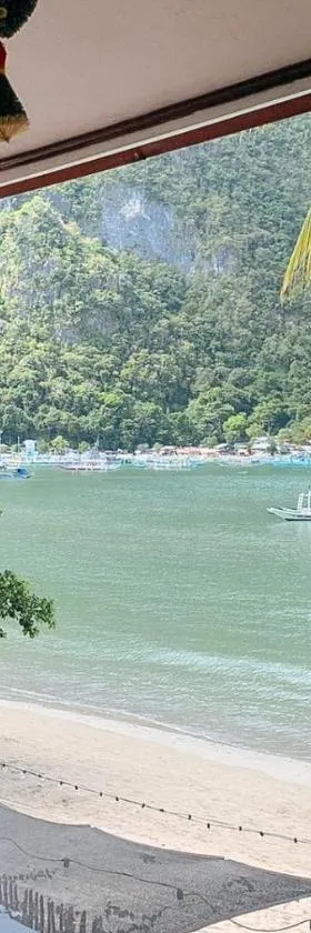 RedDoorz @ Tandikan Beach Cottages，位于爱妮岛的酒店
