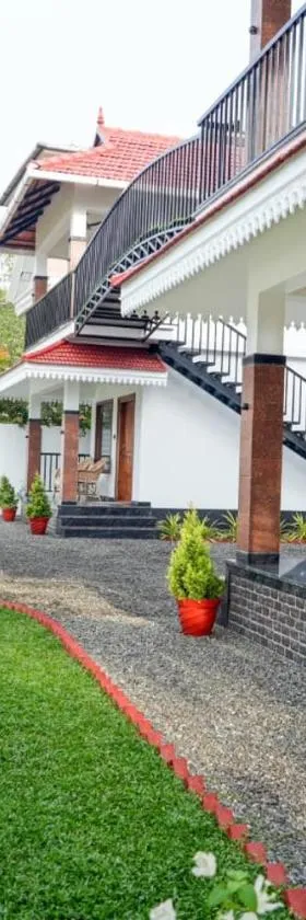 Coconut Palms Village Homestay，位于库玛拉孔的酒店