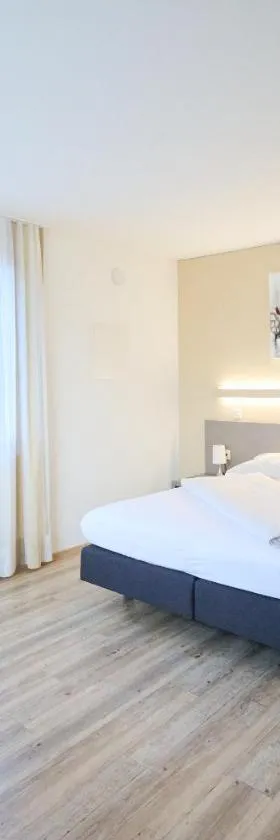 Smart Hotel Kreisel --Self check-In，位于拉亨的酒店