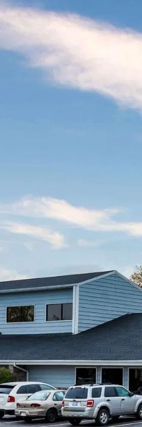 梅诺米尼阿美瑞辛酒店，位于Menominee的酒店