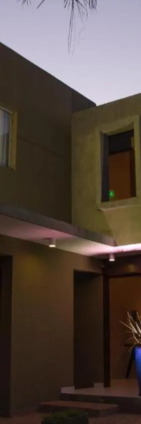 法罗北套房酒店，位于亚松森的酒店