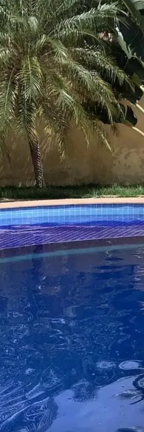 Casa Charmosa com Piscina - Quartos Privativos，位于圣雷蒙多-诺纳图的酒店