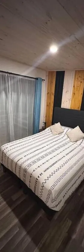Noche de descanso y tinaja con vista al bosque，位于Huehuinco的酒店