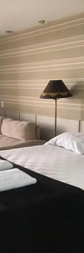 Flat Hotel morador 1110 Suíte,Sofá,Varanda,Cozinha，位于新伊瓜苏的酒店