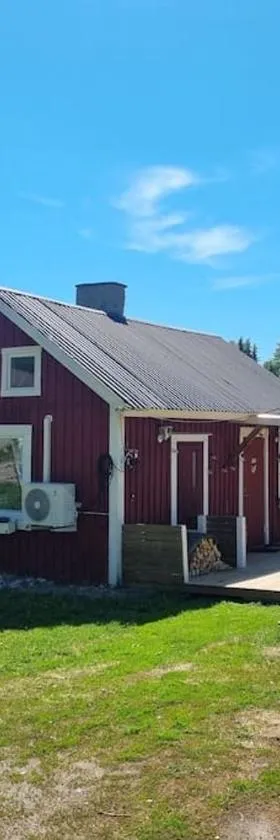 Kotoisa mökki paljulla ja puusaunalla，位于Orimattila的酒店