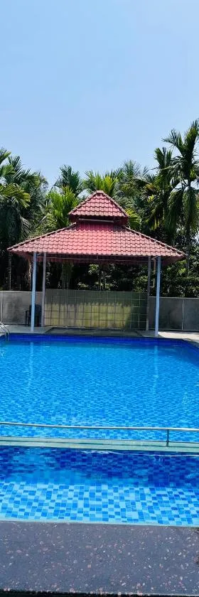 Nisarg farm house beach resort Kashid，位于卡希德的酒店