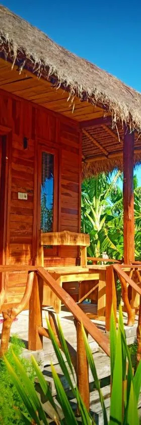 Umah Kayu 2-Menjangan Homestay，位于班尤温当的酒店