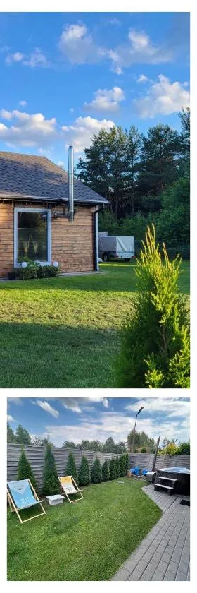 Mazury Dom Oluś nad jeziorem Sasek Wielki z gorącą balia z funkcją jakuzzi，位于什奇特诺的酒店