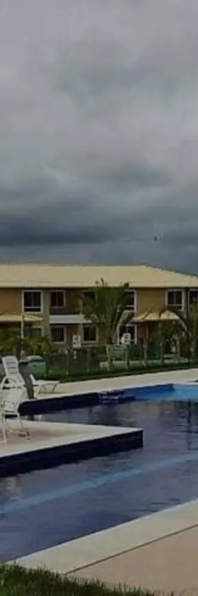 APT Completo - Ar-condicionado, Wi-FI, piscina, garagem, portaria - aconchegante，位于卡鲁阿鲁的酒店