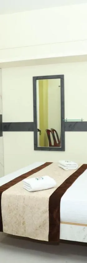 M R Residency Belagavi，位于贝尔高姆的酒店