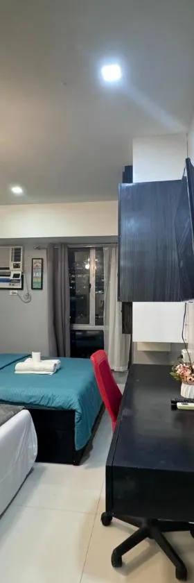 Luxanos Condo Place- Avida Tower, IT Park，位于塔博克的酒店