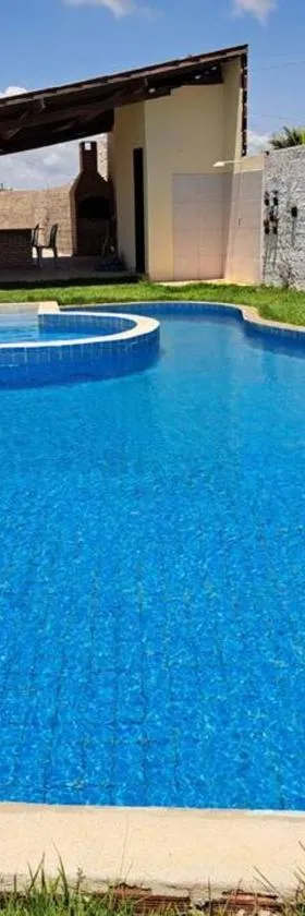 Praia Tabuba do Morro Branco Suíte 04 pessoas，位于贝贝里比的酒店