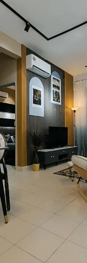 A boutique Warm falim home，位于Kampong Pasir Puteh的酒店