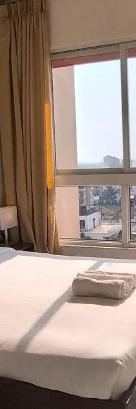 Goodstay Sunlit Bliss Cozy2BHK with Luxe Touch704，位于达波林的酒店
