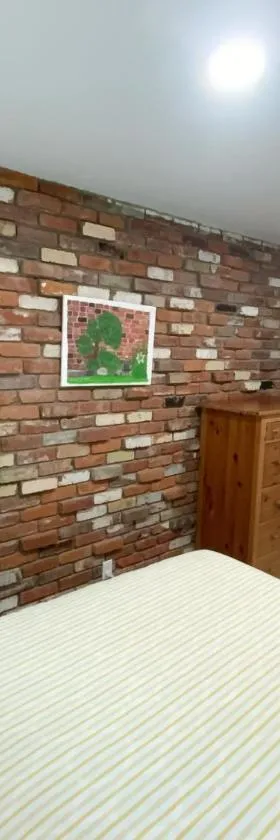 1 bedroom in a quiet neighborhood near the main street - Room C，位于罗兰岗的酒店