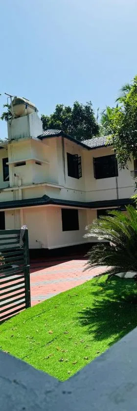 Dream House Near IIM Kozhikode & NIT Calicut，位于科泽科德的酒店
