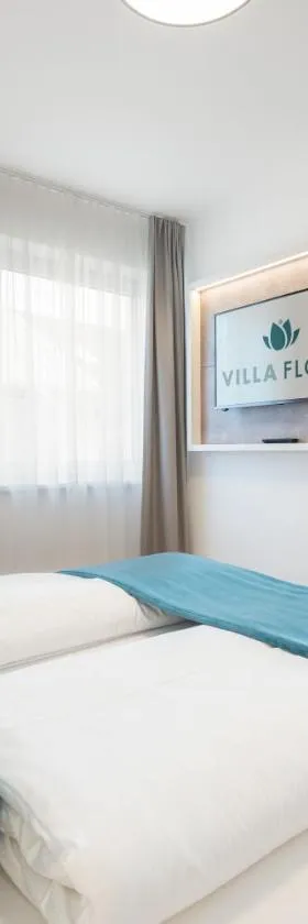 弗洛拉别墅酒店，位于沃尔特湖畔韦尔登的酒店