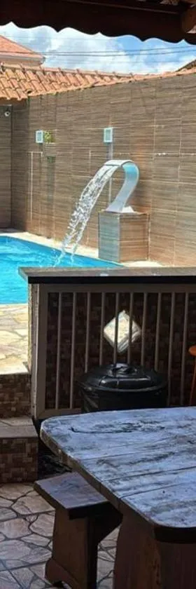 Piscina, Churrasqueira, Ar Condicionado e 3 Vagas de Garagem，位于蒙加瓜的酒店