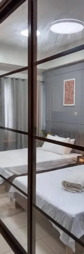 Cozy Home and Staycation Resort at Hill Residences Novaliches QC，位于马尼拉的酒店