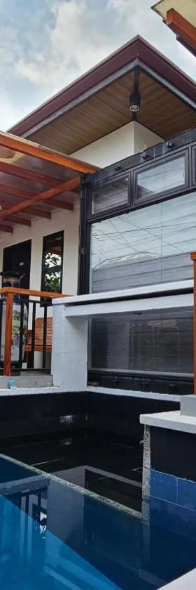 Jolie Joe's Bed and Breakfast with Shared Bathroom，位于Tagudin的酒店
