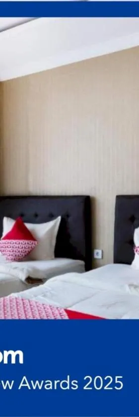 Super OYO Collection O 3431 Hotel Alpha Bandara，位于巨港的酒店
