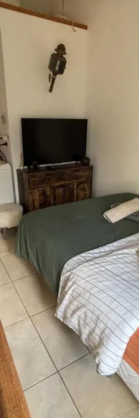 Appartement maison de village à Ota-Porto，位于奥塔港的酒店
