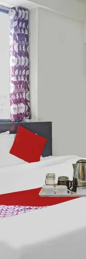 Super Hotel O R K Exclusive，位于辛加瓦迪的酒店