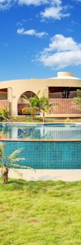 ELIVAAS Urvi Suites, Bengaluru，位于Kumbalgod的酒店