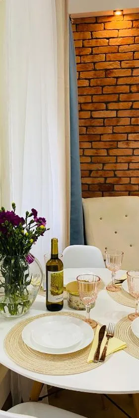 Przytulny apartament z tarasem，位于奥尔什蒂内克的酒店