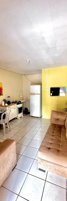 Suíte privativa com cozinha completa, ar e Wi-Fi，位于帕尔马斯的酒店