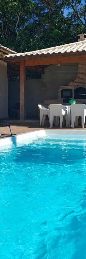Chalé da Márcia com Piscina e Churrasqueira Privativos，位于布齐奥斯的酒店