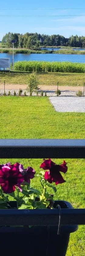 Apartamentai Prie Tvenkinio，位于Vydmantai的酒店