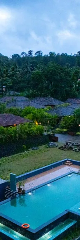 Clover Holiday Village Coorg Resort by VOYE HOMES，位于马迪凯里的酒店