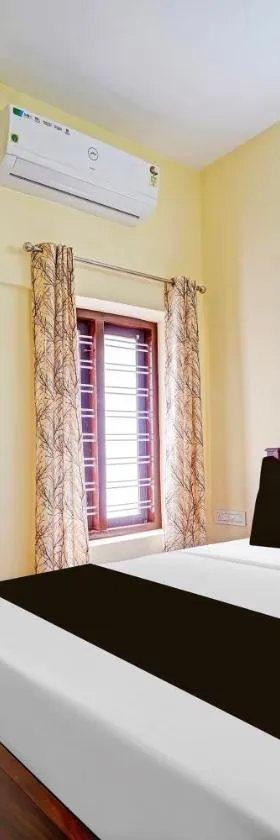 Super Hotel O Omalloor Temple Formerly MTS Lodge，位于Pathanāmthitta的酒店