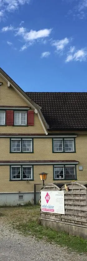 人与犬的绿洲住宿加早餐旅馆，位于Uzwil的酒店