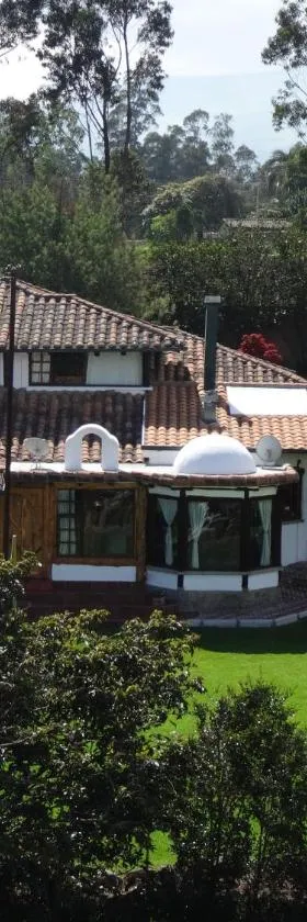 赞桑特山林小屋，位于Puembo的酒店