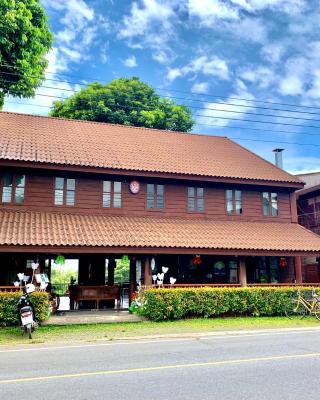 Riverhouse Hotel (The Teak House)