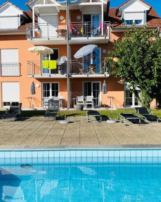 Das Schneckenhaus - Ferienwohnung mit Pool & Seeblick