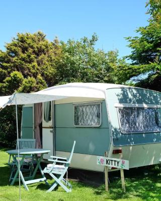 KItty unique 60s caravan set in pretty garden