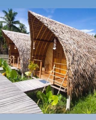 Palayan Paradise Huts