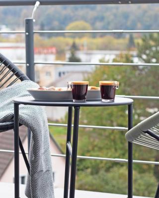 BlackNCozy - Design Appartement mit Boxspringbett und Balkon