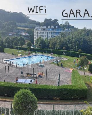 Soleado piso con garaje y piscina a 8' centro